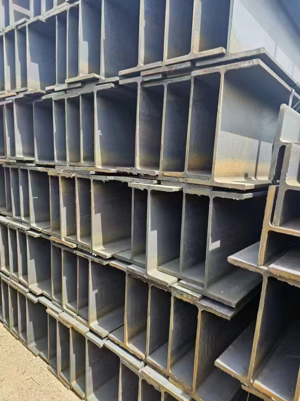 ASTM A36 A992 קרן H מגולגלת חמה Q235B Q345B פלדה מגולוונת לריתוך מבנה פלדה אוניברסלי H-לספק כיפוף וחיתוך